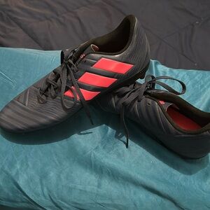 Women’s soccer cleats, size 10